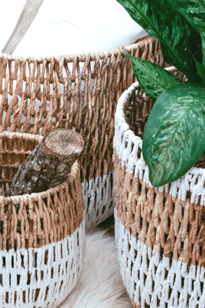 DIY Painted Wicker Baskets. Dipped wicker baskets are one of the hottest home trends right now. You don't have to buy new baskets, paint your old ones! || Yellow Rose Life ||